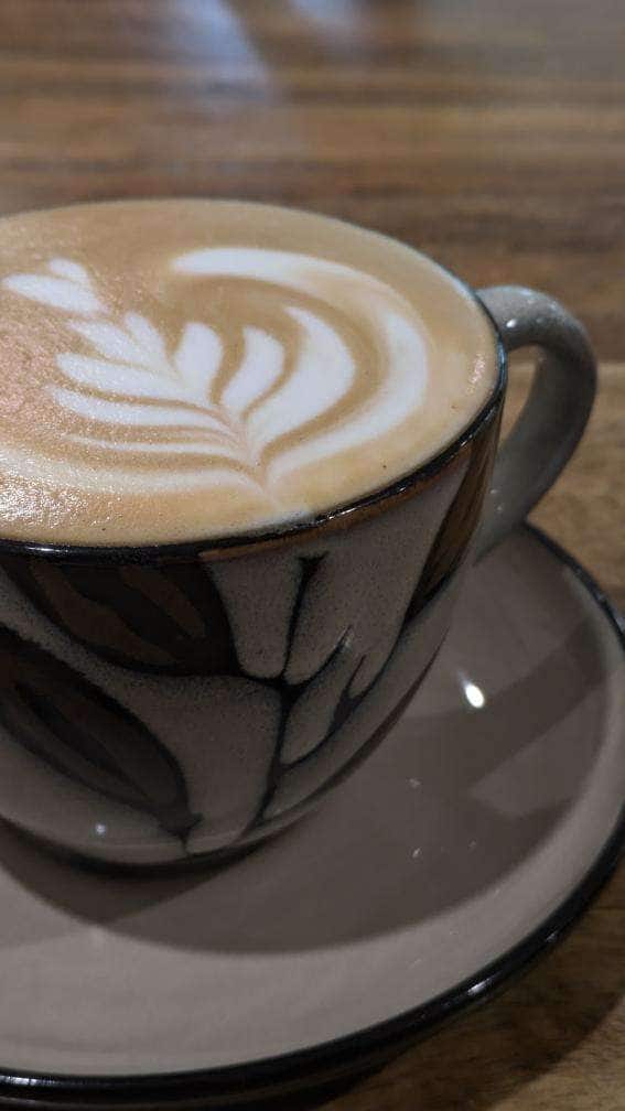 Cappuccino with latte art at Feranoz